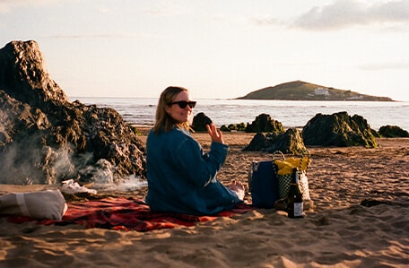 Women sitting on a beach Women sitting on a beach